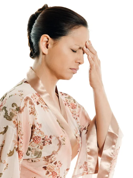 Dolor de cabeza mujer asiática — Foto de Stock