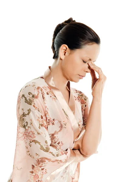 Porträt einer reifen Frau mit Kopfschmerzen — Stockfoto