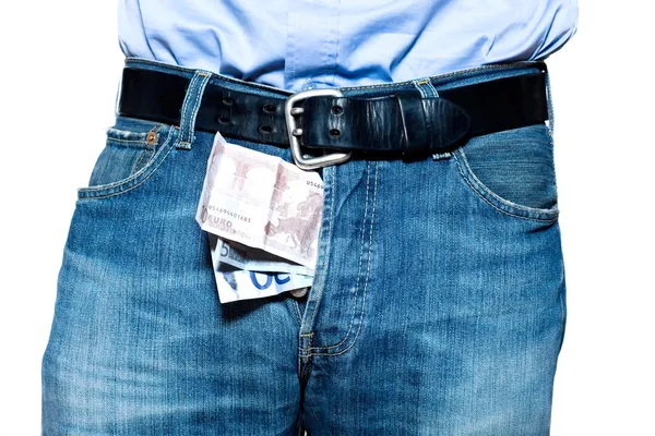 Tiro de detalhe da moeda euro em jeans jeans jeans azul — Fotografia de Stock