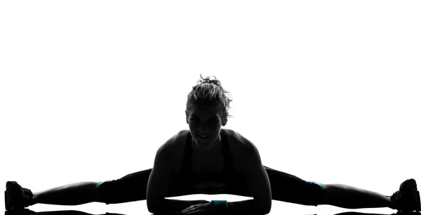 Γυναίκα στάση Γυμναστήριο προπόνηση που εκτείνεται το χωρίζει — Φωτογραφία Αρχείου
