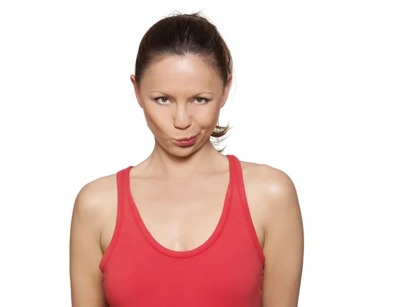 Portrait of beautiful expressive woman puckering lips — Stock Photo, Image