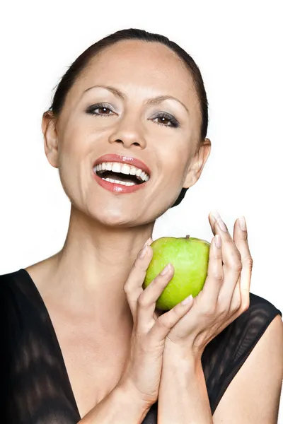 快乐的美丽女人举行绿色苹果的肖像 — 图库照片