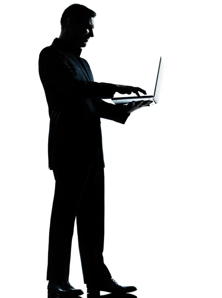 One business man silhouette computing computer laptop — Stock Photo, Image