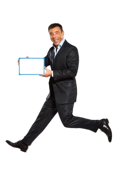 One man running jumping holding whiteboard Royalty Free Stock Photos
