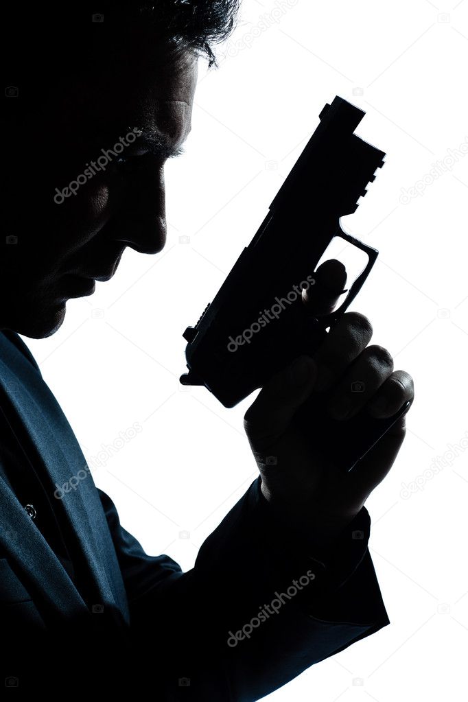 Silhouette man portrait with gun