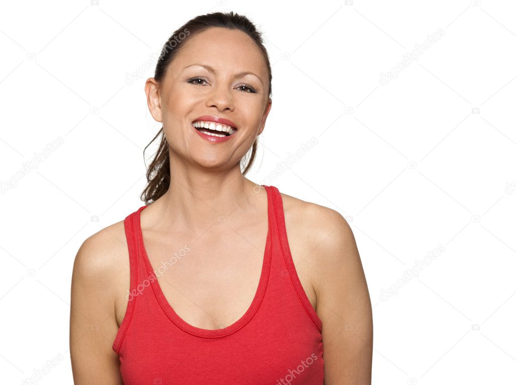 Portrait of happy beautiful Asian woman laughing