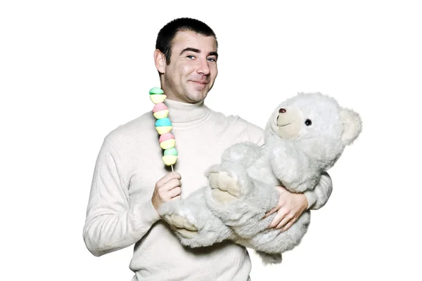 Childish mature man and teddy bear — Stock Photo, Image
