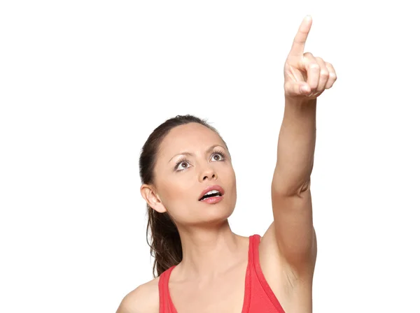 Porträtt av söta uttrycksfulla förvånad kvinna pekar uppåt — Stockfoto