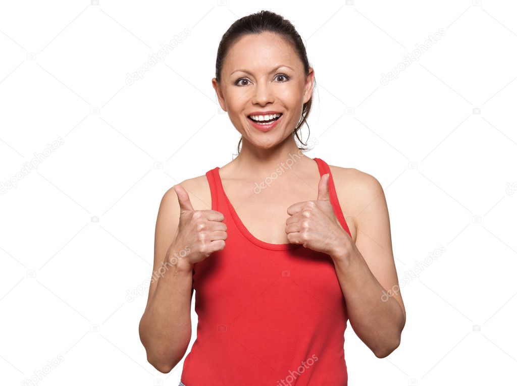 Portrait of cute happy woman showing thumbs up