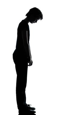 One young teenager boy or girl sad looking down silhouette clipart