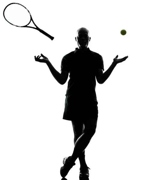 Silhouette man tennis player standing throwing ball and racket — Stock Photo, Image