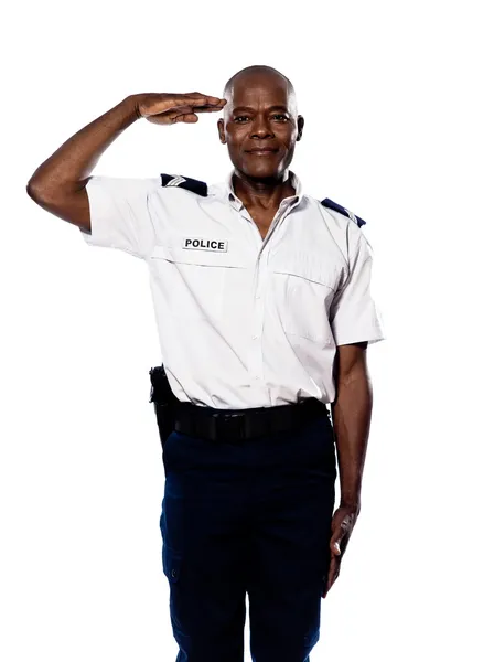 Porträtt av polis salutera — Stockfoto