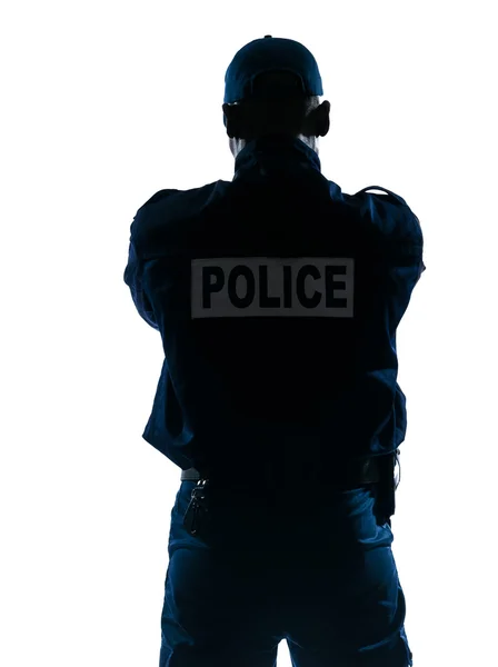 Вид сзади на полицейского — стоковое фото