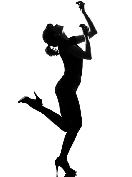 Женщина-силуэт танцует фламенко — стоковое фото