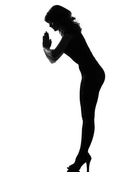 Silhouet vrouw die groet — Stockfoto