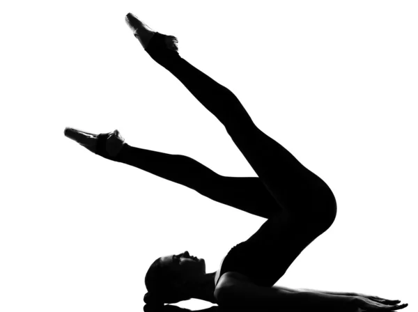 Woman ballet dancer halasana Shoulder Stand yoga pose — Stock Photo, Image
