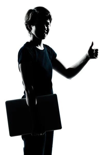 One young teenager boy girl silhouette holding carrying laptop c — Stock Photo, Image