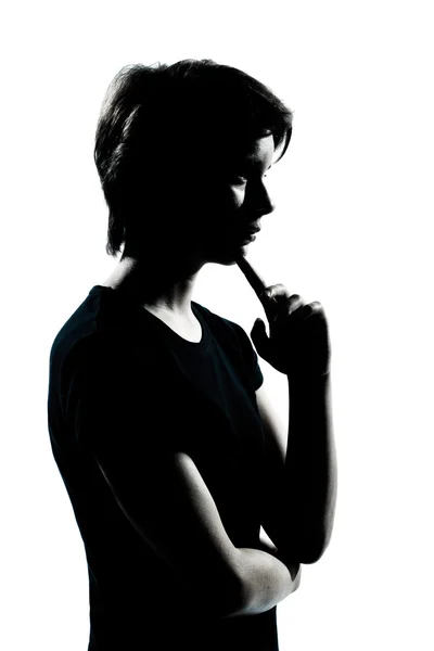 One young teenager boy or girl silhouette thinking — Stock Photo, Image