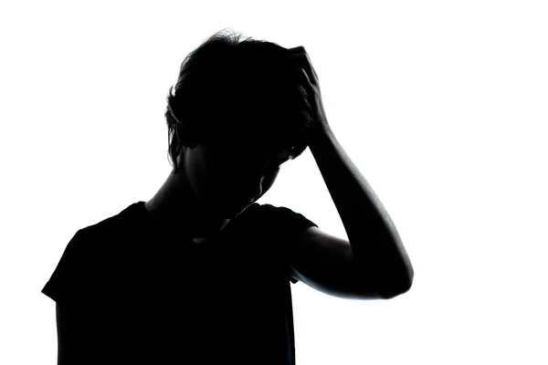 One young teenager boy or girl thinking problems silhouette — Stock Photo, Image