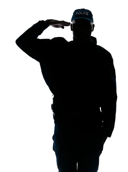 Silhouetted image of policeman saluting Stock Picture