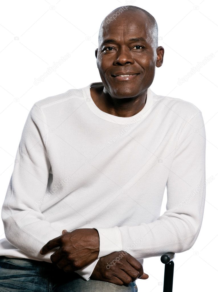 Portrait of a casual mature man sitting on chair