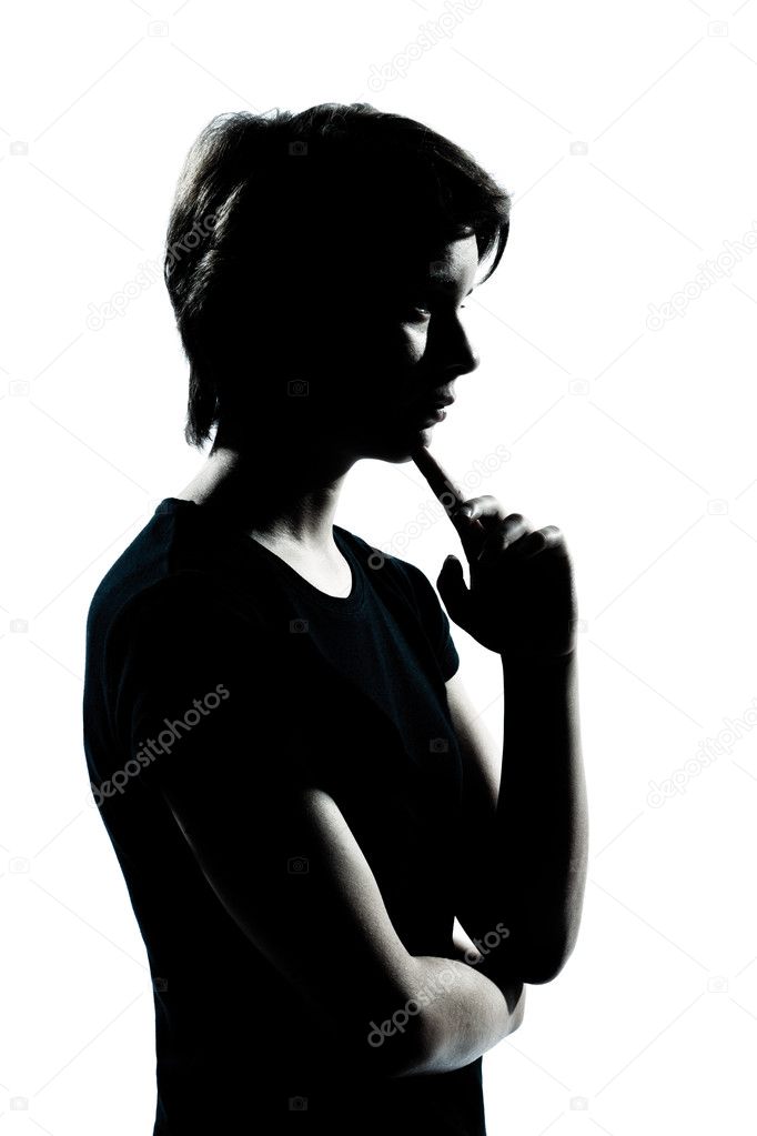 One young teenager boy or girl silhouette thinking