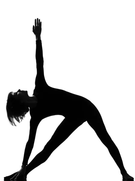 Parivritta trikonasana женщина yoga треугольная поза — стоковое фото