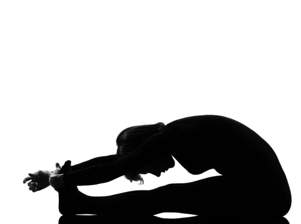Mulher paschimottanasana ioga pose — Fotografia de Stock