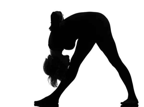 Kadın parsvottanasana şiddetli yan esneme yoga pose kadın — Stok fotoğraf