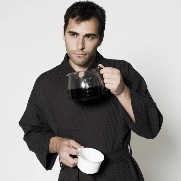 Handsome man in a bathrobe — Stock Photo, Image