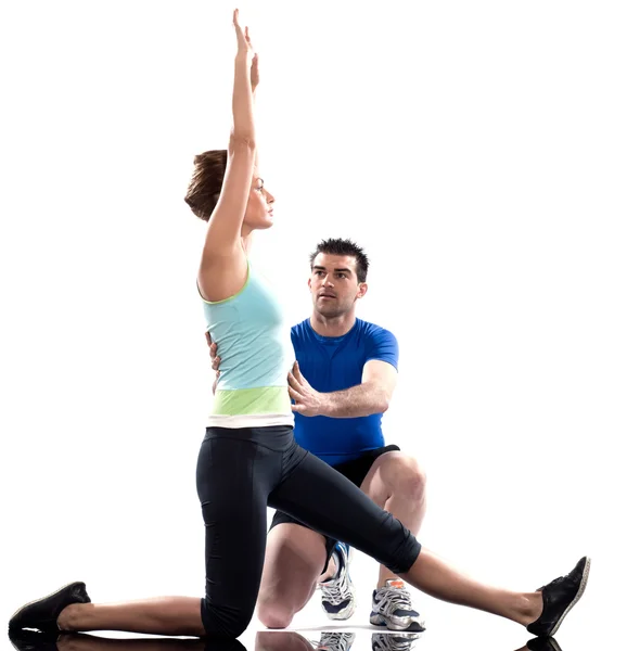 Man aerobic trainer positioning woman Workout — Stock Photo, Image