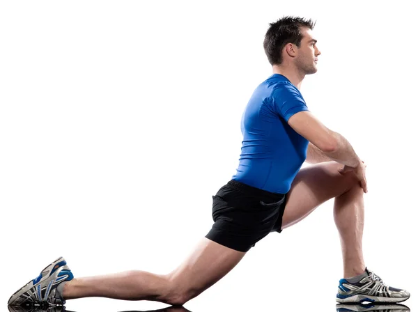 Man träning hållning fitness motion knästående stretching benen — Stockfoto