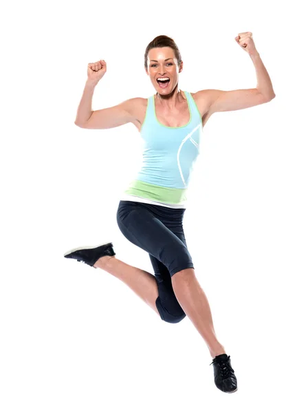 Mulher sportswear feliz salto — Fotografia de Stock