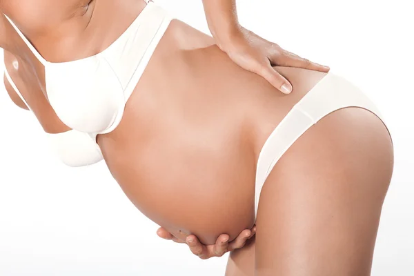 Mulher grávida detalhe dor nas costas — Fotografia de Stock