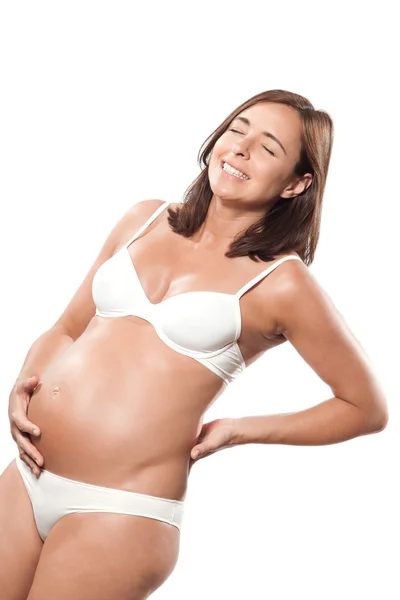 Gravid kvinna stående ryggvärk — Stockfoto