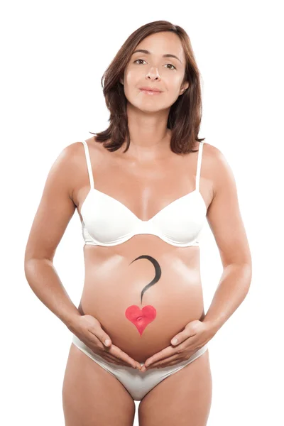 Zwangere vrouw met hart getrokken op de buik — Stockfoto