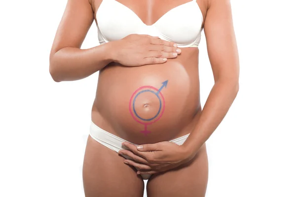 Gravid kvinna med hjärtat på magen — Stockfoto