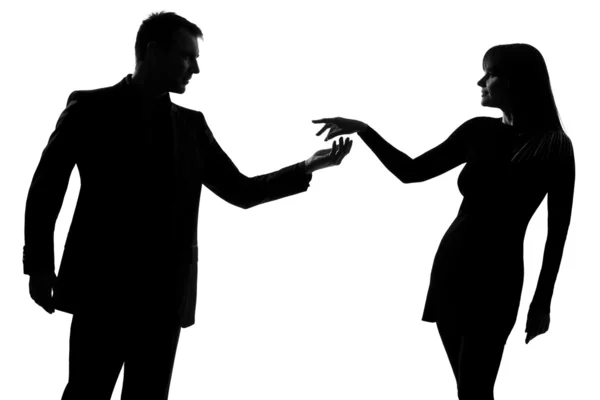 Un hombre de pareja sosteniendo invitando mano en mano mujer — Foto de Stock