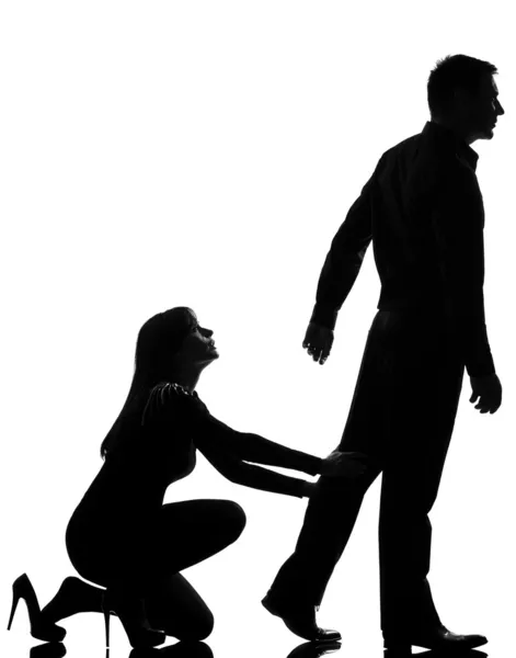 One couple dispute separation man leaving and woman holding back — Stock Photo, Image