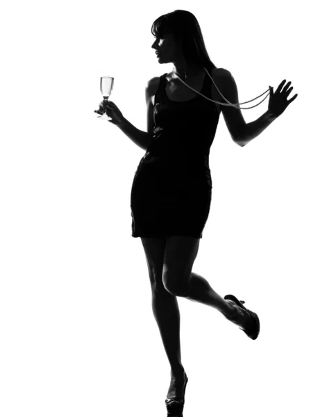 Stijlvolle silhouet vrouw feesten drinken champagne — Stockfoto