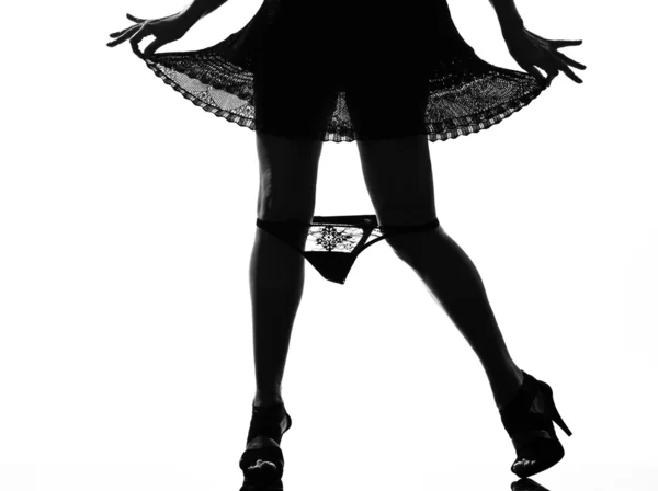 Elegante silhouette gambe donna perdere la biancheria intima — Foto Stock