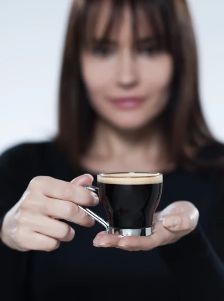 Woman drinking offering coffee — Stock Photo, Image