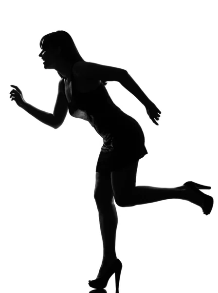 Stijlvolle silhouet vrouw running gelukkig — Stockfoto