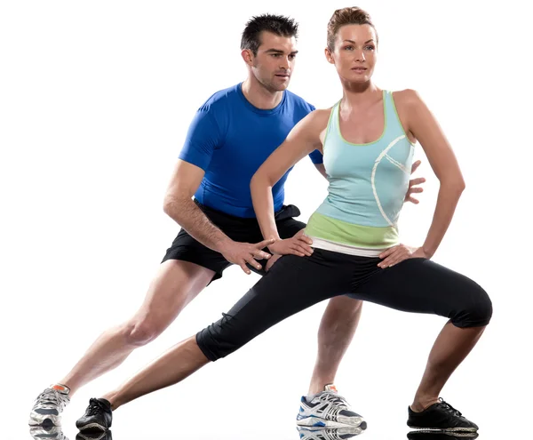 Mann Aerobic Trainer Positionierung Frau Workout Stockfoto