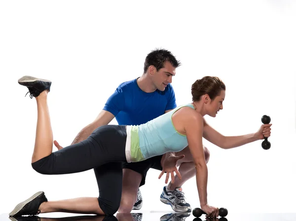 Man aerobic trainer positioning woman Workout Stock Image