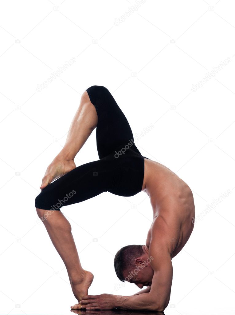 Man doing yoga, pilates, fitness training, asana Eka Pada