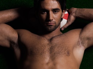 Sexy topless rugby man portrait clipart