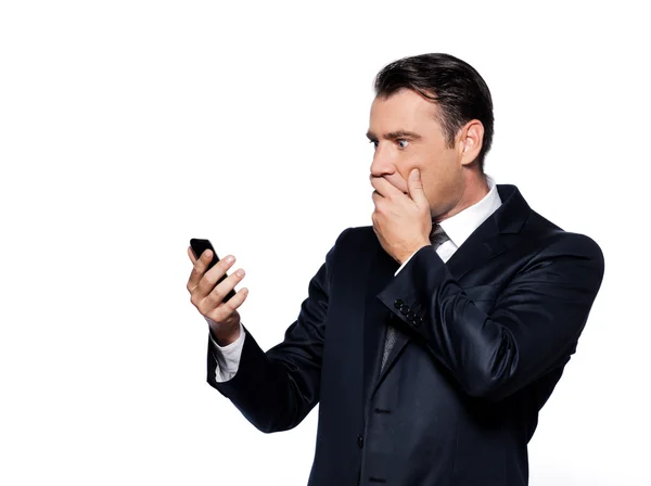 Homem de negócios no telefone chocado — Fotografia de Stock