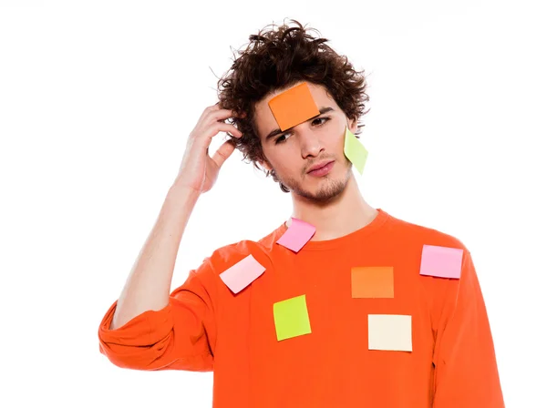 One young man portrait covered by adhesive notes — Stock Photo, Image