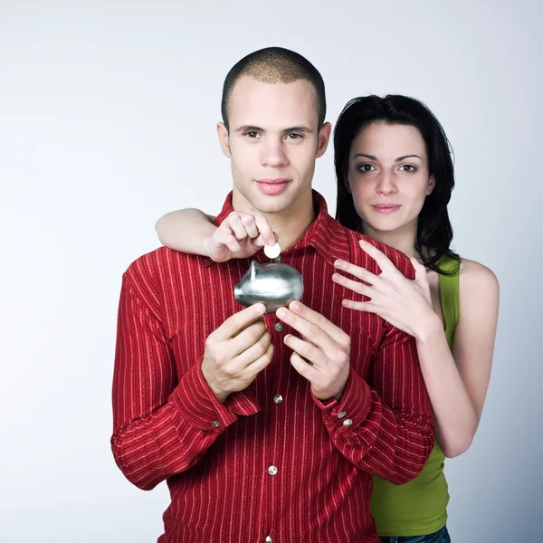 Casal jovem poupança — Fotografia de Stock